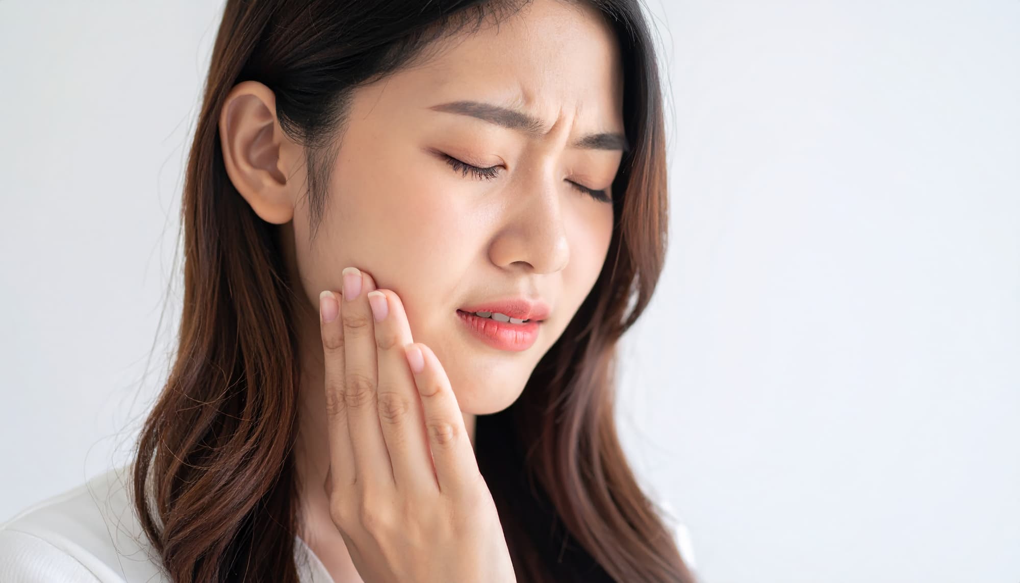 口腔トラブルに悩む妊娠中の女性